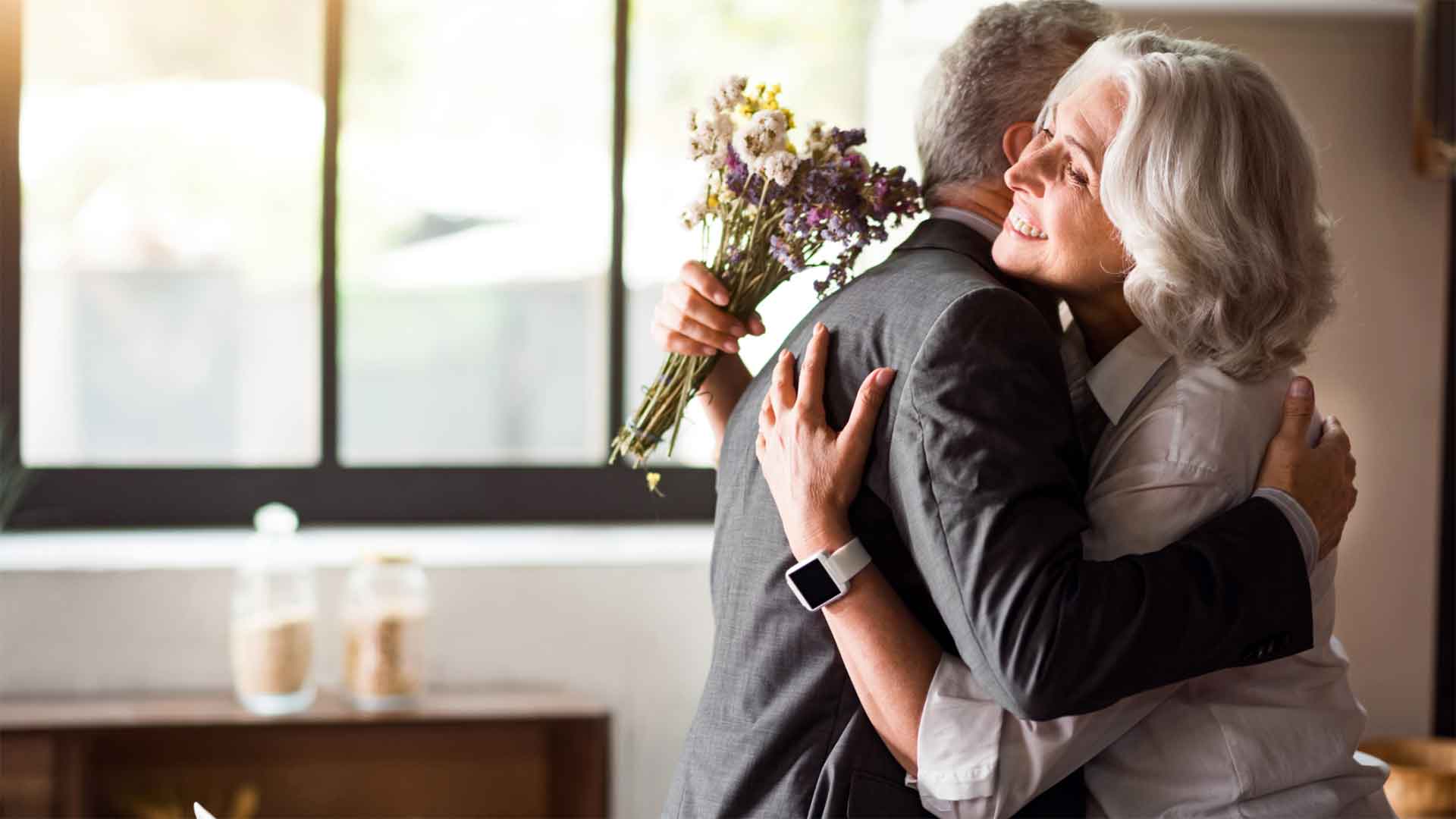 Mature couple hugging