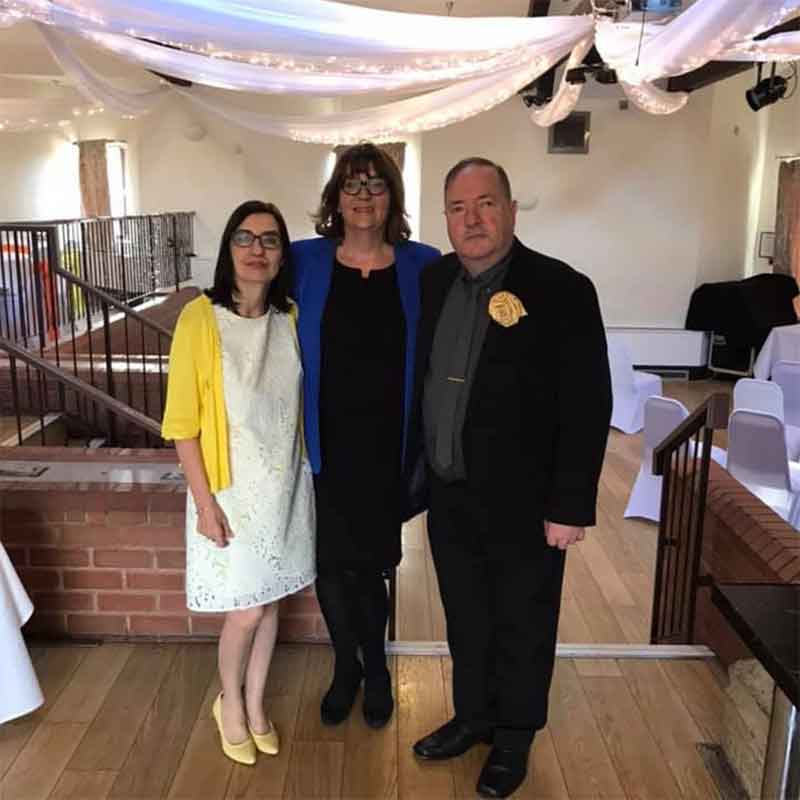 Jeanette with a happy couple after renewing their vows